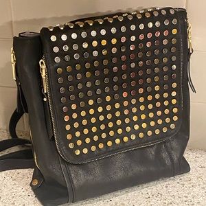 Spectacular black and gold INC leather backpack purse!